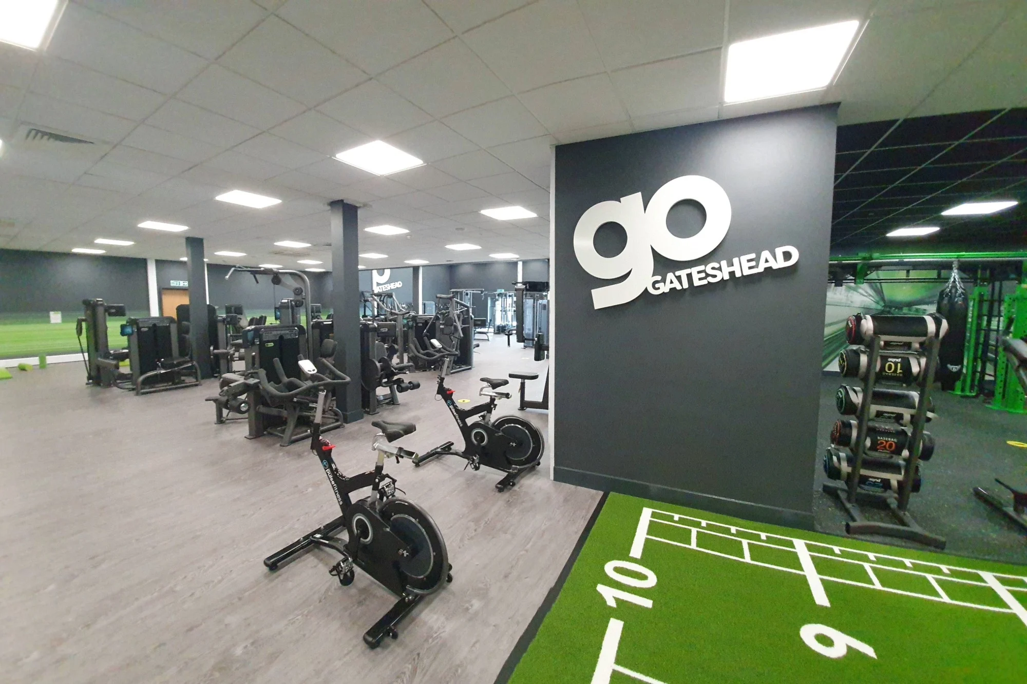 Interior of Go Gateshead gym, featuring accent black walls.