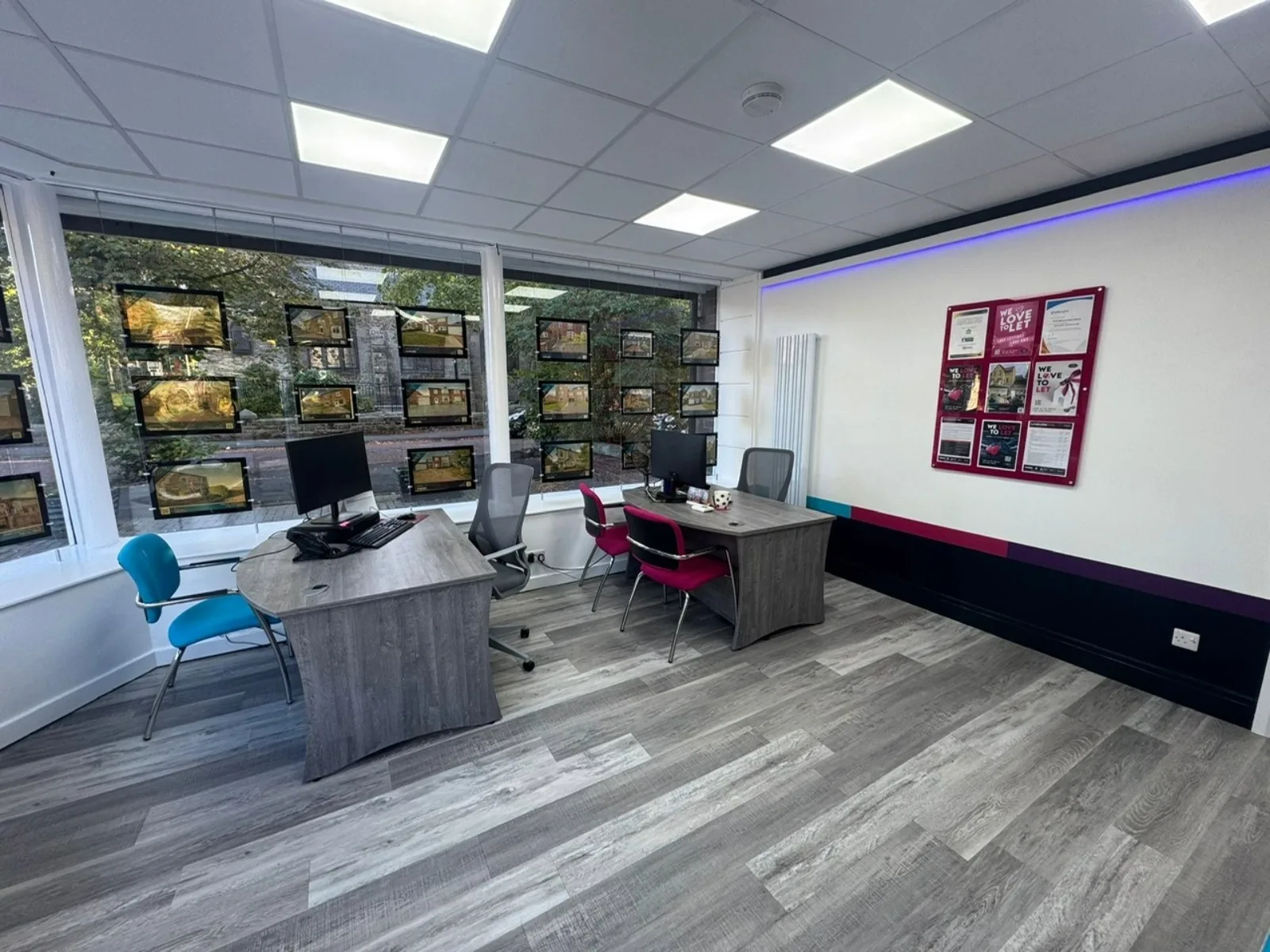 The newly refurbished interior of RMS Forest Hall with large windows and open space.