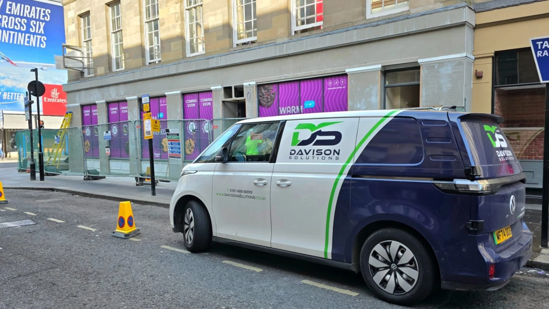 A branded Davison Solutions van parked on the street in Newcastle.